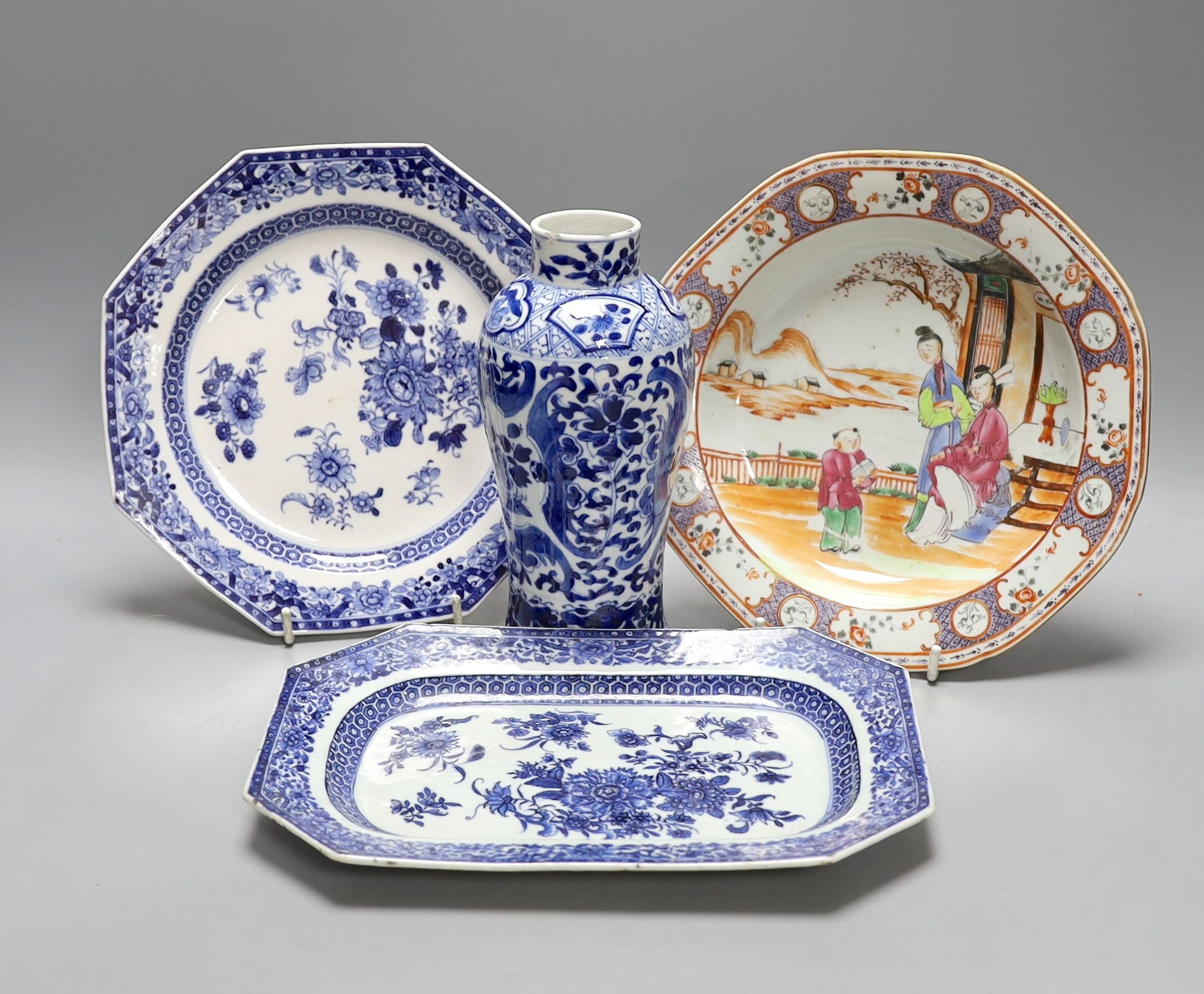 An 18th century Chinese export blue and white plate and dish, a blue and white vase and a famille rose plate